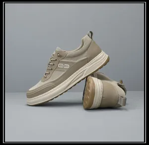 Detailed view of the thick sole and fabric texture of these khaki men's dad sneakers.