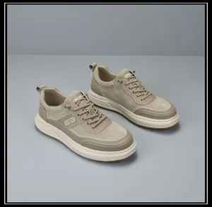 Side view of stylish men's thick-soled khaki casual sneakers with lace-up detail