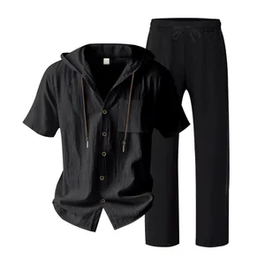 Detailed view of black linen-textured hooded shirt and long pants casual set for men.