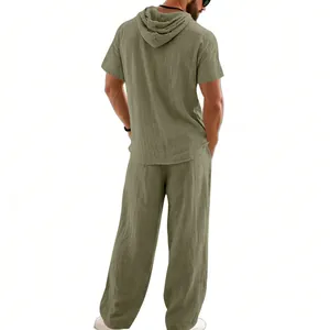 Detailed back view of a men's loose breathable linen hooded shirt and long pants set in green