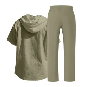 Back view of a men's sage green linen set showing the hooded shirt and casual pants