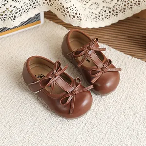 Vintage brown faux leather Mary Jane shoes for girls with elegant double bow design