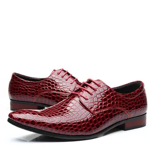 Elegant men's pointed-toe business dress shoes featuring a bold red crocodile pattern