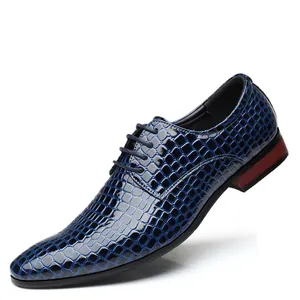 Blue patent leather dress shoe with embossed stone pattern and pointed toe design