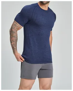 Detailed shot of seamless men's athletic T-shirt showing navy blue breathable fabric