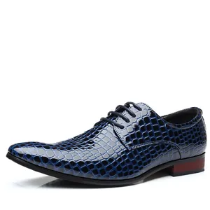 Detailed side view of blue glossy crocodile pattern dress shoe with classic lace-up design.