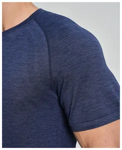 Close-up of breathable seamless fabric texture on men's blue sports T-shirt