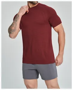 Close-up view of a men's maroon seamless breathable athletic fitness training t-shirt