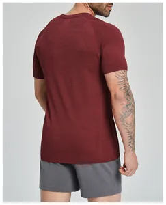 Back view of men's seamless maroon athletic T-shirt showing breathable texture and fit