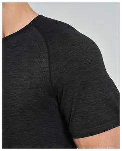 Close-up detail of seamless breathable men's sports t-shirt fabric and raglan sleeve