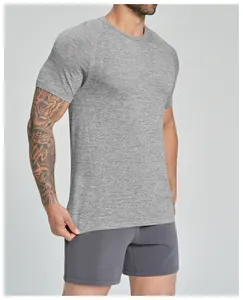 Detailed view of gray seamless sports T-shirt fabric texture on a fitness model's body