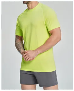 Detail of men's neon green seamless sports T-shirt showing fit and breathable fabric