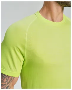 Close-up of lime green seamless sports T-shirt showing breathable micro-perforated texture