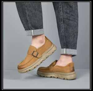 Detailed view of men's genuine leather loafers featuring thick soles and buckle accents.