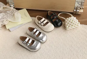 Detailed view of British style children's leather Mary Janes in various colors
