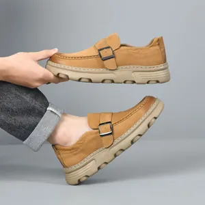Stylish retro men's tan leather loafers with thick soles and decorative buckle detail