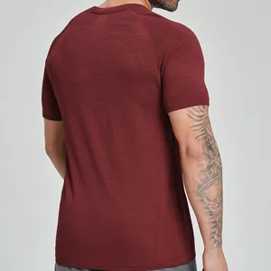 Back view of a men's burgundy seamless breathable sports T-shirt for fitness and gym