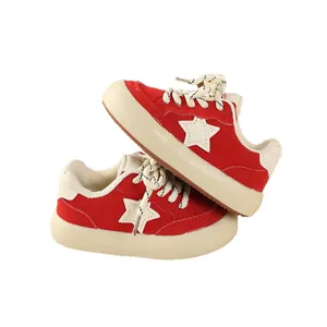 Retro red kids sneakers with white star logo and thick beige soles