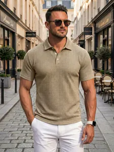 Close-up of khaki jacquard textured polo shirt featuring a classic lapel and three buttons