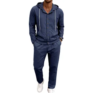 Full view of men's navy blue loose linen hooded shirt and long pants set on model