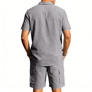 Back view of a grey linen short-sleeve shirt and matching multi-pocket cargo shorts.