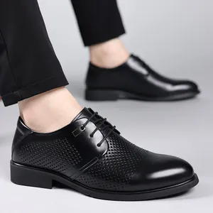 Classic black perforated men's business leather shoes for professional formal wear.