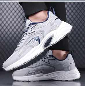 Close-up detail showing the breathable mesh upper of men's casual sneakers in grey and blue