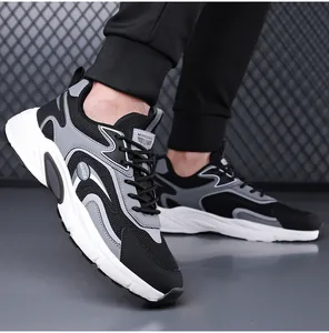 Detail view of stylish black and grey breathable mesh sports casual shoes for men