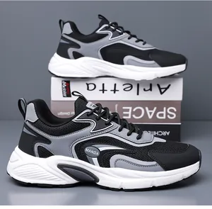 Detailed side view of breathable black and gray mesh sneakers for men on display