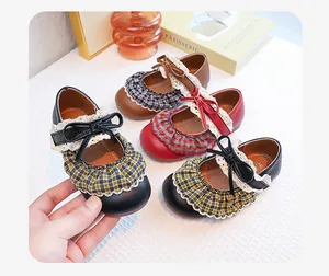 Detailed view of retro ruffled Mary Jane shoes for girls in black, red, and brown colors