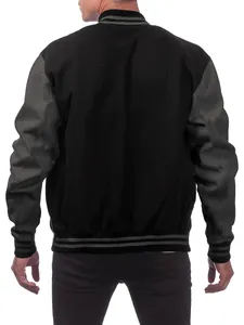 Rear view of a men's black and grey stand collar varsity jacket with ribbed hem.