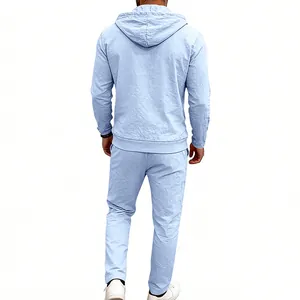 Detailed back view of men's light blue linen hooded long sleeve shirt and trousers set