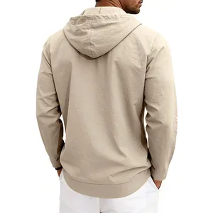 Back view of a beige linen hooded shirt showing fabric texture and hood detail.