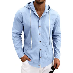 Detail view of light blue men's linen hooded shirt with long sleeves and buttons