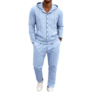 Detailed view of men's light blue linen hooded shirt and pants set on model