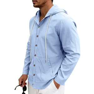 Detailed side view of a men's light blue linen hooded shirt with stylish brown buttons
