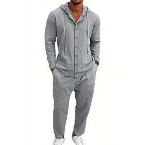 Detailed view of gray linen hooded shirt and loose pants set for men casual style