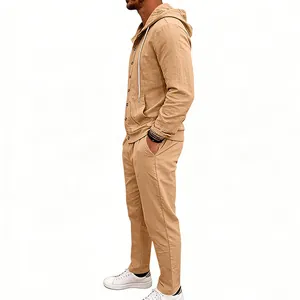 Side view of men's loose khaki linen-like hooded shirt and trousers two-piece set