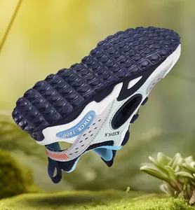 Macro view of breathable kids' summer sports sandals with textured non-slip sole