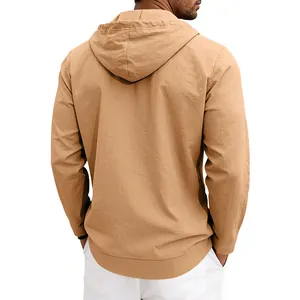 Detail view of men's loose linen hooded long-sleeve shirt in camel from the back