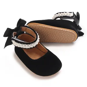 Detailed view of baby girl velvet princess shoes with pearls and non-slip sole