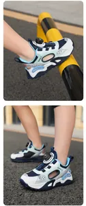 Close-up of kids' breathable mesh sneakers with rotary dial buckle and hollow side design