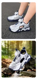 Close-up of kids breathable mesh sports shoes featuring a convenient rotary lacing system