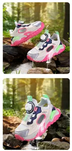 Close-up of kids' summer sports shoes with rotary knob and breathable hollow mesh design