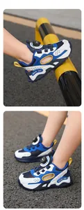 Close-up of children's breathable mesh sneakers with rotating dial buckle closure