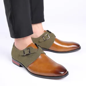 Detailed shot of men's bicolored leather dress shoes featuring olive green suede and buckle