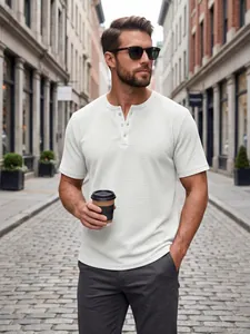 Premium men's slim-fit waffle texture Henley shirt shown in a casual outdoor street setting.