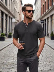 Detailed shot of dark grey slim fit men's Henley shirt featuring soft waffle texture