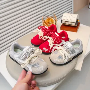 Casual meisjessneakers in German Training-stijl met ademend mesh en geborduurde strik