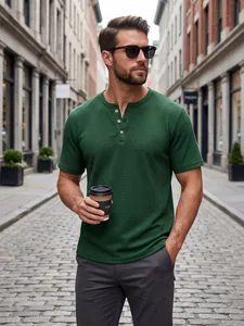 Detail of a green waffle-knit Henley shirt for men featuring a classic button placket.
